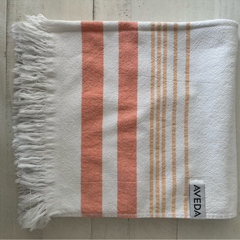 AVEDA Striped Beach or Bath Towel in Coral and White